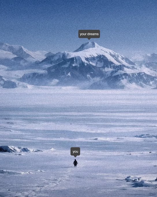 A snowy landscape with a distant snow-capped mountain labeled 'your dreams' and a small figure in the foreground labeled 'you', illustrating a vast distance between aspirations and the individual.