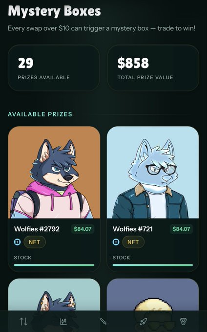 Mobile app screen for 'Mystery Boxes' showing 29 prizes available worth $858 total, featuring NFT wolf characters Wolfies #2792 and Wolfies #721 each valued at $84.07.