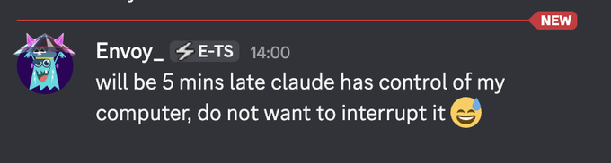 A Discord message from user 'Envoy_' reading: 'will be 5 mins late claude has control of my computer, do not want to interrupt it' with a laughing emoji.