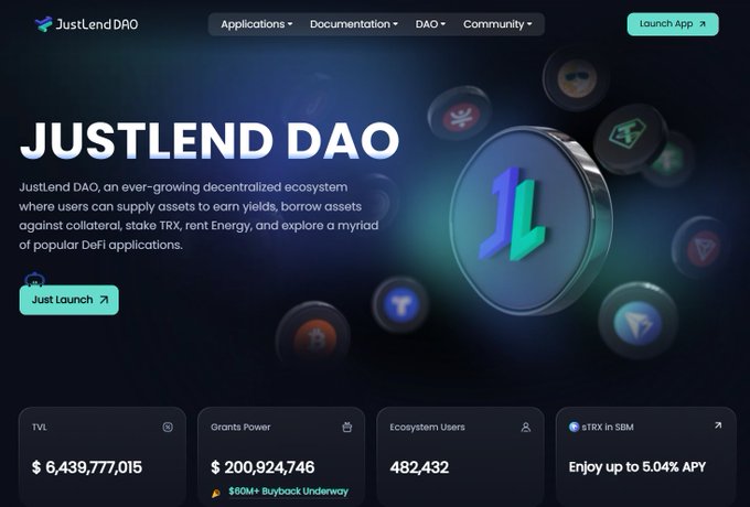 The image features a website called JustLend DAO, which appears to be an application for lending money or providing financial services. The website has a dark blue background with white text that displays information about the application's features and benefits. There are several circles on the page representing different aspects of the application, such as grants power, TVL, and documentation.

The image also includes a small amount of text in the bottom right corner, which reads "JustLend DAO". This might be an error message or a warning related to the application's status or functionality.