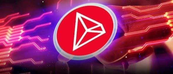 The red Tron (TRX) cryptocurrency logo displayed on a smartphone screen with circuit board graphics in the background.