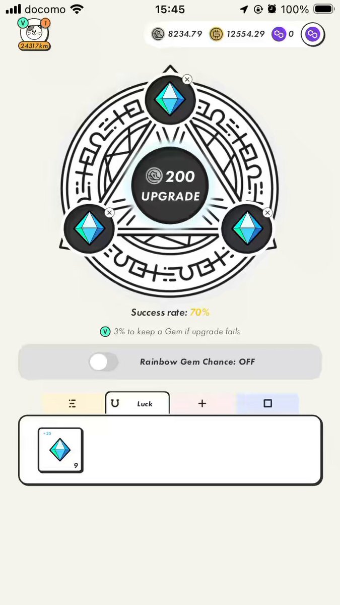 The image shows a phone screen with an app icon, which appears to be a game or puzzle. The background of the screen features three symbols, possibly representing different levels or stages within the game. A text box can also be seen on the screen, likely providing instructions or information about the game.