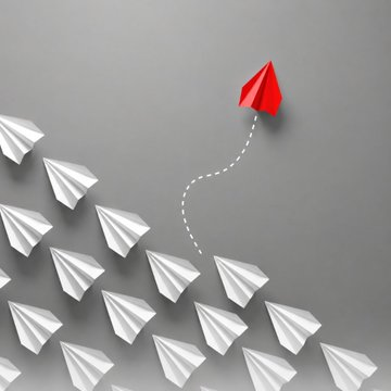 A red paper airplane soars upward, breaking away from a formation of identical white paper airplanes, leaving a dotted trail behind it. The image symbolizes leadership and differentiation, visually representing how TRON DAO stands out from the crowd by hosting exclusive gatherings like the TRON Whale Night during the Bitcoin conference series.