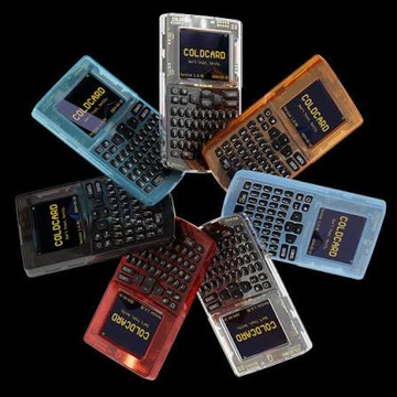 A circular arrangement of various colorful Coldcard hardware cryptocurrency wallets on a black background, including models Mk4 and Q1.