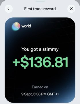 The image shows a "First trade reward" notification from World, celebrating a user receiving a "$136.81" stimulus earned on September 9th at 5:38 PM GMT+1. This aligns with the post's gratitude toward Worldcoin's ecosystem, highlighting a tangible crypto reward that contributes to the user's impressive free 200k milestone.