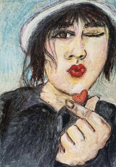 A colored pencil or oil pastel artwork depicting a winking girl with dark hair, red lips, holding a red heart near her face while wearing a white hat.