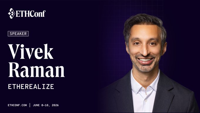 The image features a man wearing a suit and tie standing against a purple background, smiling at the camera. The text "ethcon" is visible, indicating that this photo was taken at an Ethical Computing conference. The caption below the photo reads "June 8-10 in NYC: Wall Street meets Ethereum at @ethconf - BlackRock, Fidelity, Mastercard, 100+ companies." This suggests that the image was taken during a conference where speakers discuss the potential of Ethereum to revolutionize various industries and transform the global financial system.