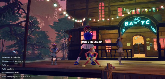 A screenshot from a video game showing characters on a wooden dock outside a building labeled 'BAYC' with string lights, while a chat window displays messages including 'Happinesscatt: Gm guys~!'.