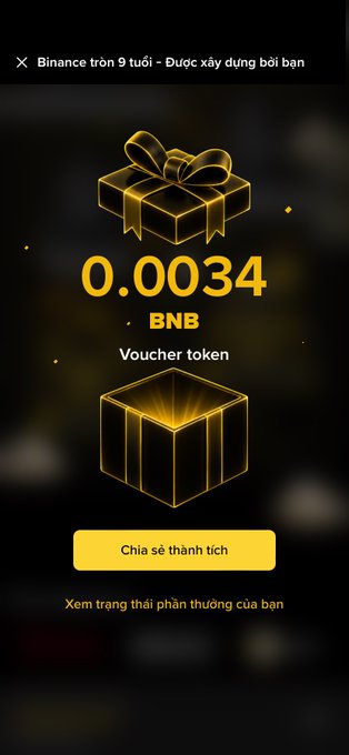 A Binance promotional screen displaying a 9th anniversary reward of 0.0034 BNB voucher token, featuring a "Chia sẻ thành tích" (Share achievement) button and a link to view reward status, which ties into the post about participating in Binance's $4.5M anniversary giveaway pool.