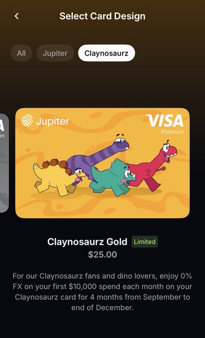 A mobile app screen for a financial service called 'Jupiter' shows the 'Select Card Design' page, highlighting the limited 'Claynosaurz Gold' Visa Platinum card priced at $25.00.