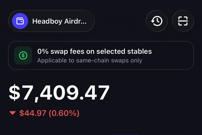 The image shows a cryptocurrency portfolio dashboard displaying a balance of $7,409.47 with a 0.60% decline ($44.97 down), under the wallet name "Headboy Airdr..." with a note about "0% swap fees on selected stables." The image serves as proof of the poster's crypto holdings and trading activity, lending credibility to their giveaway offer of $200 to 20 people who RT and comment their SOL wallet, suggesting they have the funds to fulfill the giveaway.