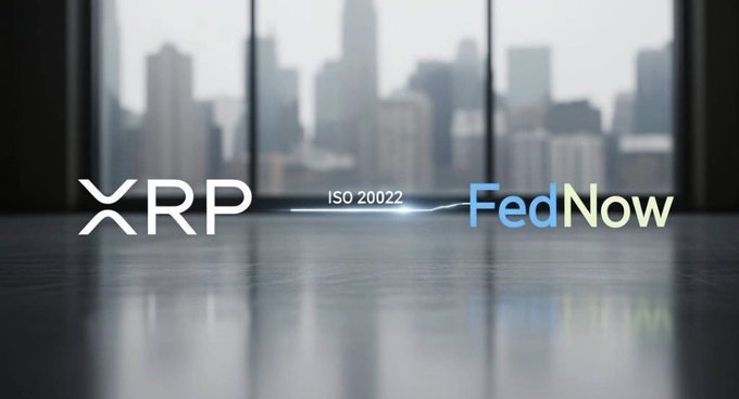 A sleek graphic displays the "XRP" logo on the left and "FedNow" on the right, connected by "ISO 20022" text against a blurred city skyline background, visually representing the integration of XRP cryptocurrency with the Federal Reserve's FedNow instant payment system as referenced in the post about Volante's adoption.