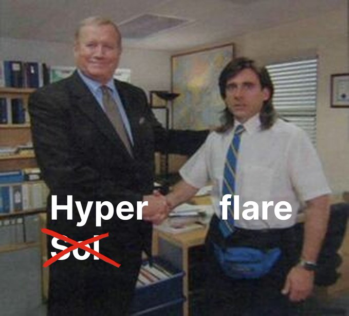 The meme shows the famous handshake scene from *The Office*, with the text "Hyper" crossed out and replaced with "flare," humorously suggesting a wardrobe upgrade where flare pants are now trendy. This plays on the "looking good chat" caption by celebrating the return of early-2000s flare style, with Robert California's sleek suit contrasted against the flannel-wearing character's bold fashion choice.