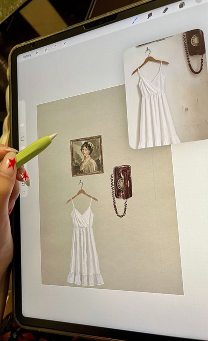 A person uses a green stylus to work on a digital collage on a tablet, featuring images of a white slip dress, a vintage camera, and a framed portrait.