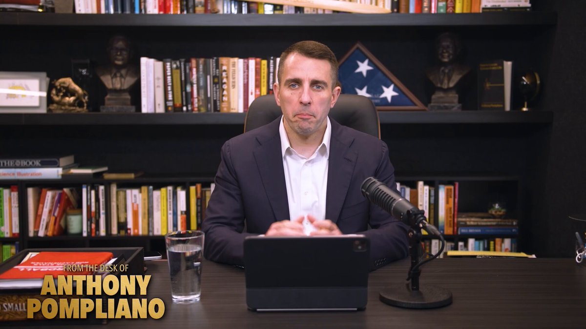 The image features a man sitting at a desk with a laptop computer, wearing a suit and tie. There are several books surrounding him, indicating that he might be involved in some form of research or work related to Bitcoin. The text "These four on-chain data points suggest Bitcoin sellers are starting to be exhausted." is also present in the image, which could imply that the man's work has led to a significant increase in Bitcoin sales and that the seller's exhaustion may be due to the high demand for Bitcoin at this time.