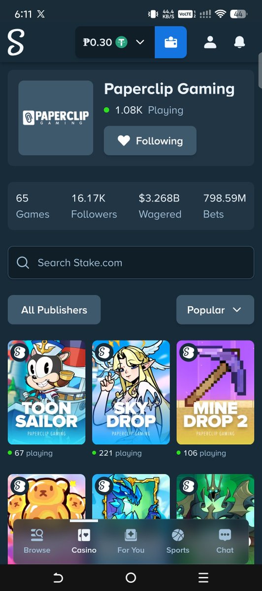A mobile screenshot of the Stake.com app showing the Paperclip Gaming publisher page with 1.08K playing, 16.17K followers, $3.268B wagered, and game tiles for Toon Sailor, Sky Drop, and Mine Drop 2.