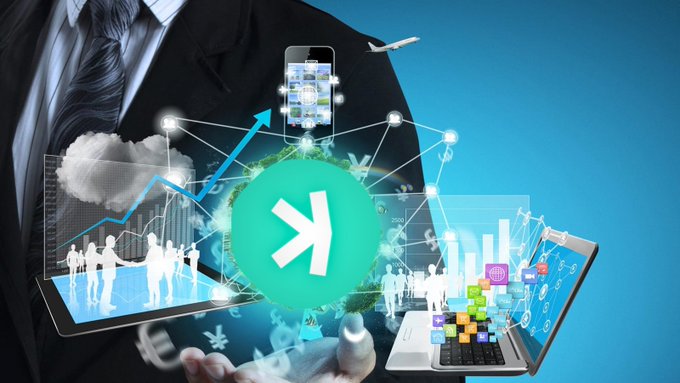 A businessman in a suit holds glowing digital graphics featuring a smartphone, laptop, airplane, charts, and a prominent cyan Yen (¥) currency symbol, representing digital finance.