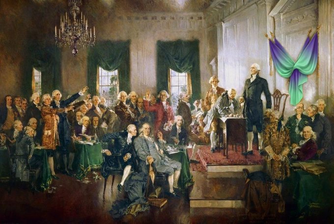 A historical painting depicting the signing of the U.S. Constitution, edited to include a large purple, green, and teal transgender pride flag hanging on the right side.