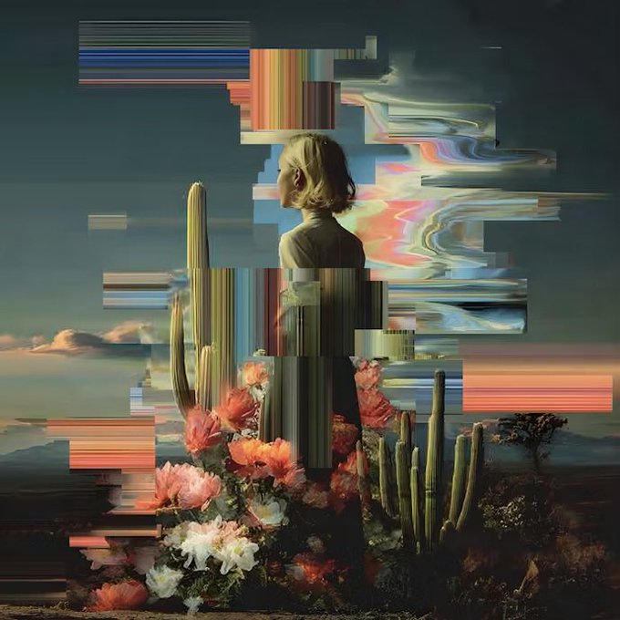 A blonde woman in a long dress stands amidst a desert landscape with cacti and blooming flowers, partially obscured by colorful glitch-like digital distortions in the sky. The image complements the "Gm" (good morning) post with its surreal, dreamlike sunrise aesthetic, though no text or numbers are visible.