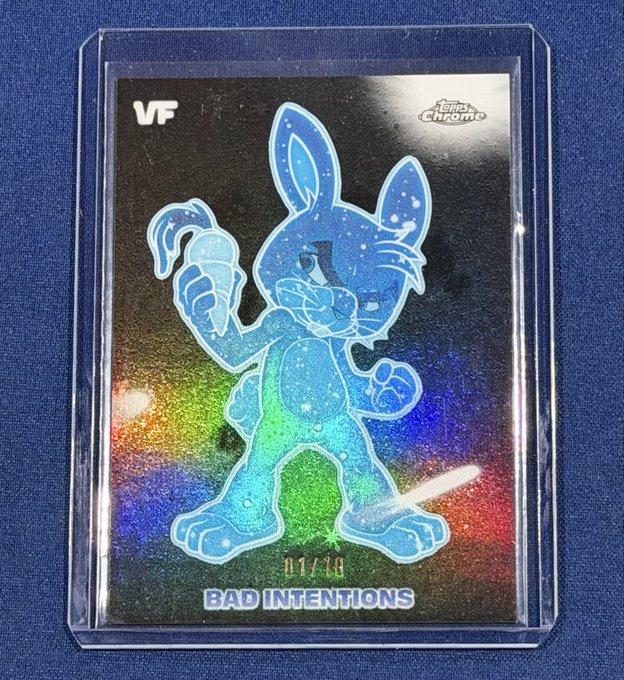 A VeeFriends "Bad Intentions" Topps Chrome Stellar Haze trading card, serial numbered 01/10, featuring an iridescent holographic blue rabbit illustration on a black background. This limited-edition card aligns with the post's celebration of the underrated Stellar Haze series.