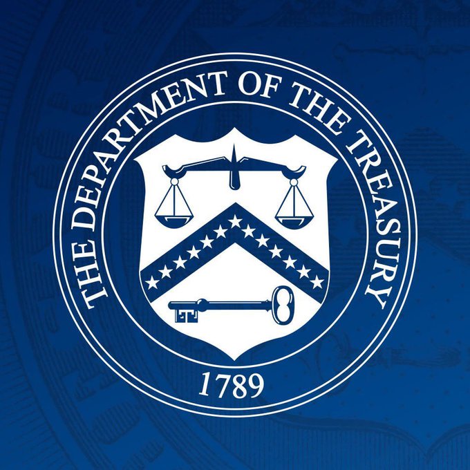 The image displays the official seal of the U.S. Department of the Treasury, featuring a shield with a balance scale, chevron with 13 stars, and a key, encircled by the text "THE DEPARTMENT OF THE TREASURY" and the founding year "1789."

The seal relates to the post as it represents the U.S. Treasury Department, the agency that froze over $130 million in crypto assets linked to wallets associated with Iran's Central Bank.