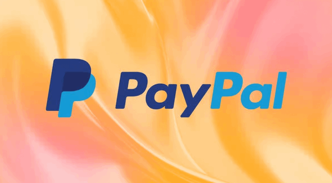 The image displays the PayPal logo against a swirling pink and orange background. This visual ties into the post's mention of Paxos serving as the infrastructure layer enabling PayPal's crypto services, highlighting the institutional connection relevant to Dogecoin adoption.