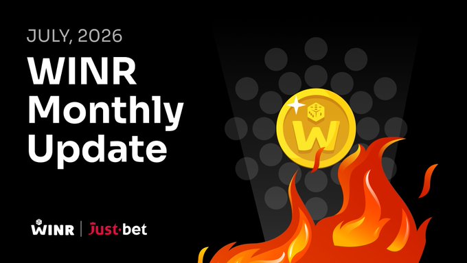 The image is a "WINR Monthly Update" graphic for July 2026, featuring a gold coin with a "W" and dice, surrounded by flames, symbolizing growth and success. It highlights the partnership with @JustBetOnchain and the $WINR ecosystem.