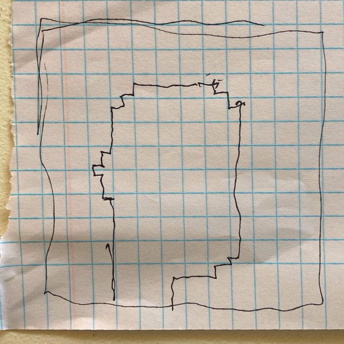 A hand-drawn sketch on graph paper showing two nested, irregular rectangular shapes in pen or pencil.