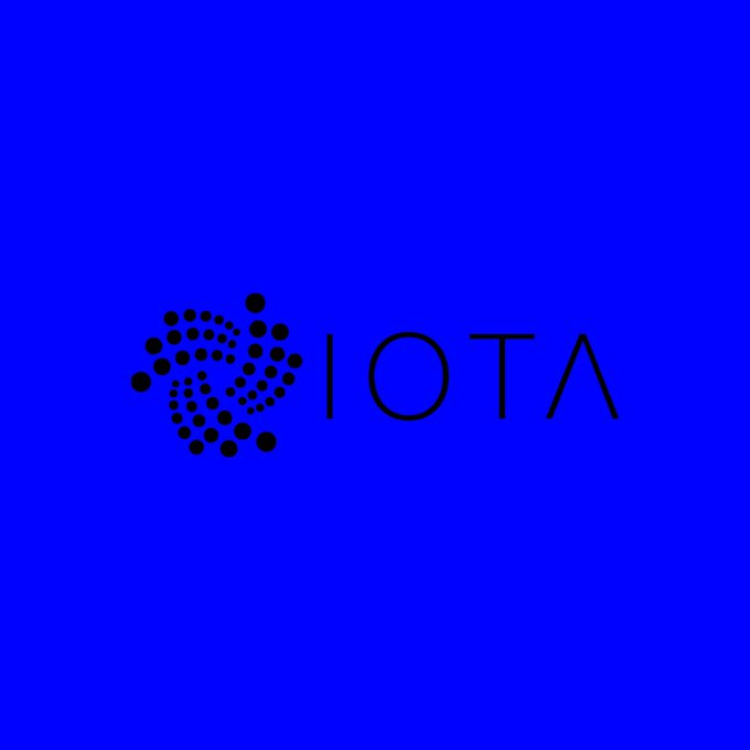 The image displays the IOTA logo—a stylized black emblem made of dots forming a hexagonal pattern alongside the "IOTA" text—set against a solid blue background. The visual reinforces the accompanying announcement that IOTA has integrated with Pyth Pro, expanding developer access to high-quality, low-latency market data.