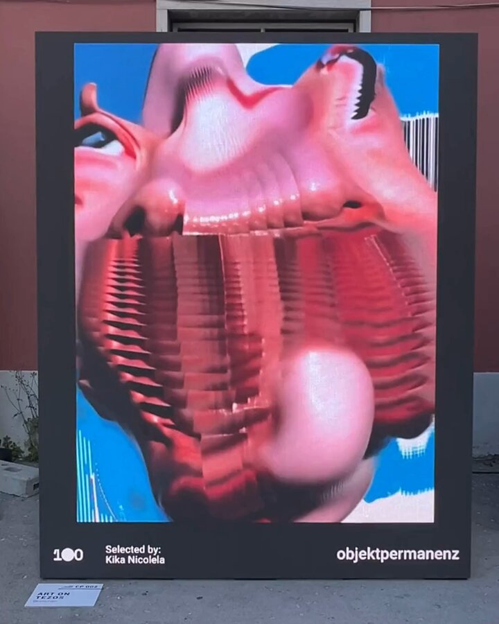 The image features an abstract painting of a face with pink lips, placed outdoors against a red wall. The painting has been displayed for 100 days at the Lisbon Objet permanenz exhibition.