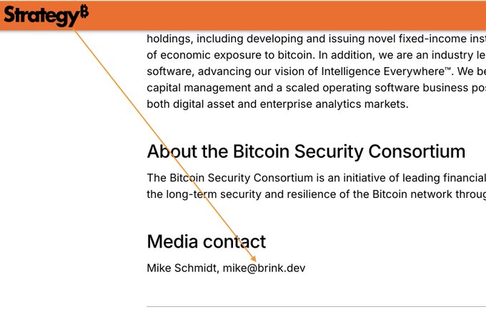 A cropped webpage section mentioning 'About the Bitcoin Security Consortium' and a media contact for 'Mike Schmidt, mike@brink.dev', with an orange diagonal line crossing the text.