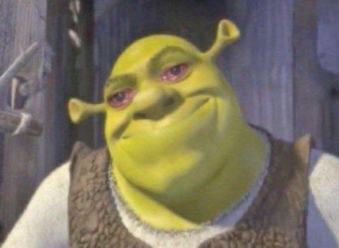 A heavily edited, distorted image of the cartoon character Shrek with exaggerated red eyes and a smirk.