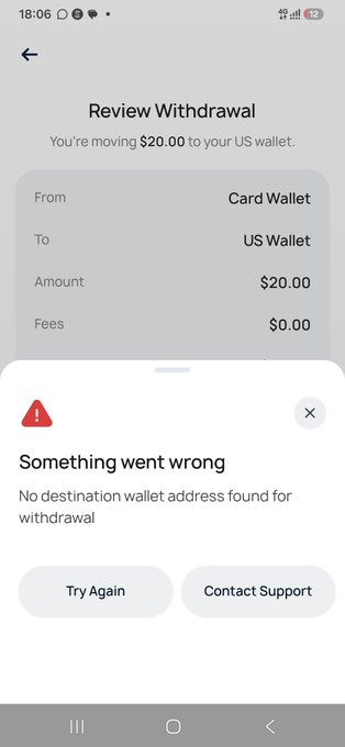 A mobile phone screenshot showing a 'Review Withdrawal' screen attempting to move $20.00 from a Card Wallet to a US Wallet, but displaying a 'Something went wrong' error message stating 'No destination wallet address found for withdrawal'.