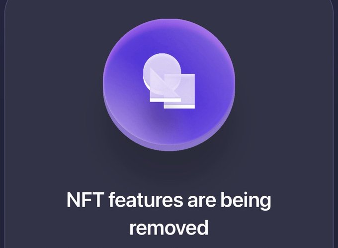 A digital graphic with a dark background displays a purple gradient circle icon featuring two overlapping speech bubbles, with the white text below reading 'NFT features are being removed'.