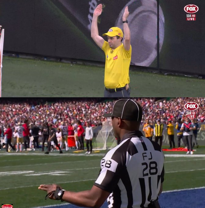 A referee in a yellow shirt raises both hands signaling a touchdown or score, while another official wearing "FJ 28" stands on the field during a Fox Sports 504 HD broadcast, contrasting the post's commentary on tokenized equities being integrated into a full financial "stack" beyond simple crypto wrappers.