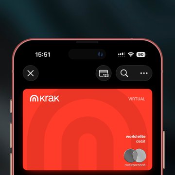 A smartphone screen displaying the Kraken virtual Mastercard in red, marked as 'world elite debit' with a time of 15:51.