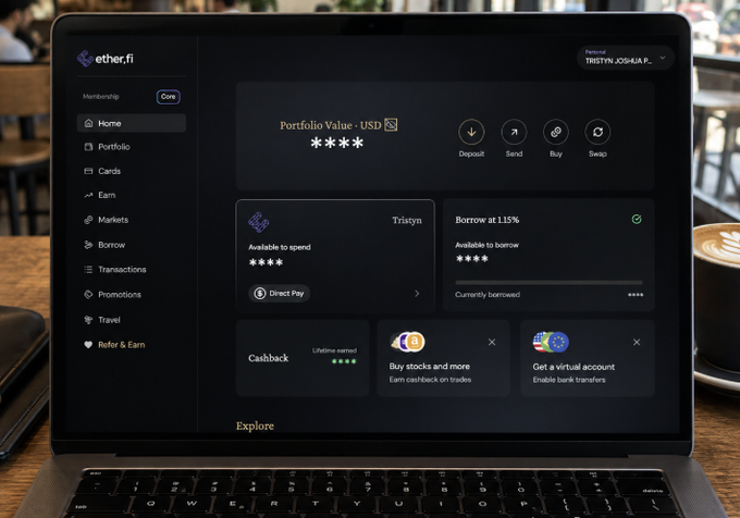 A laptop displaying the ether.fi DeFi platform dashboard with a 'Membership Core' sidebar, portfolio value masked, and options to deposit, send, buy, or swap, alongside a latte on a coffee shop table.