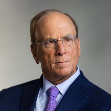 A professional headshot of an older man with glasses, graying hair, and a navy pinstripe suit paired with a purple tie, likely a senior executive at the financial firm referenced in the post about BlackRock's $50.34 million Ethereum ($ETH) purchase.