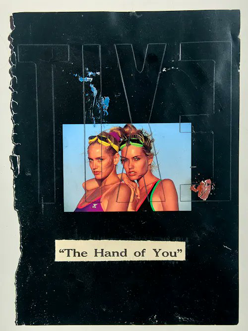A worn, vintage-style black poster or zine cover with torn edges, featuring a Polaroid-style photo of two women wearing sunglasses on their heads and the title '"The Hand of You"' printed on a beige label at the bottom.