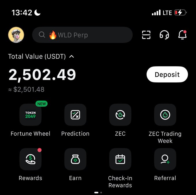 A mobile trading app screenshot shows a portfolio total value of $2,502.49 USDT with a search for "WLD Perp," and various features like Fortune Wheel, Prediction, ZEC, Rewards, Earn, Check-In Rewards, and Referral. The post seems to casually highlight their afternoon crypto trading session, tagging @kryptnitan in a playful endorsement.
