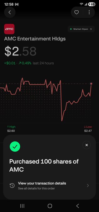 A screenshot of a trading app showing AMC Entertainment Holdings (AMC) at $2.58, with a confirmation pop-up that reads "Purchased 100 shares of AMC."