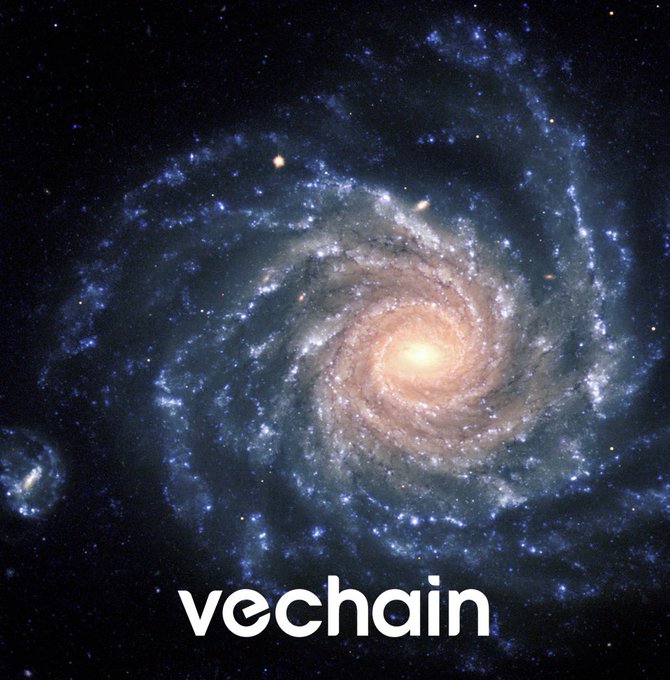 A spiral galaxy in deep space with the word 'vechain' written in white text at the bottom.