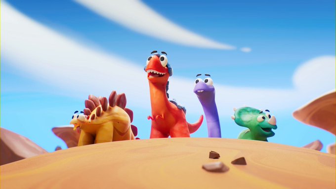 Four colorful cartoon dinosaurs stand on a sandy hill beneath a bright blue sky in an animated scene.