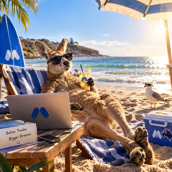 A whimsical illustration shows a kangaroo wearing sunglasses lounging on a beach chair with a laptop and drink, while a seagull stands nearby and a surfboard and cooler display an 'M' logo.