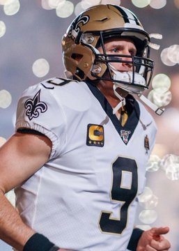 A New Orleans Saints player wearing jersey #9 and a captain's "C" patch stands on the field, which relates to the post noting the Broncos contacted that player, Drew Brees, to potentially play in the AFC Championship Game last season after Bo Nix's injury.