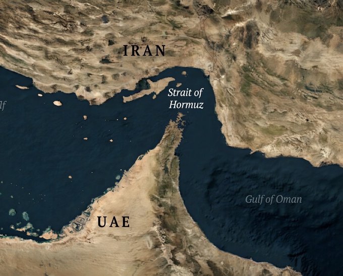 The image shows a map with two countries labeled "Iran" and "Hormuz", which are located near each other at the Strait of Hormuz. The map also includes the Gulf of Oman, indicating that these regions share a maritime boundary. In the background, there is a satellite image of the Strait of Hormuz, showing its location in relation to the United States. A post on Twitter mentions Bitcoin hitting $74,000 after President Trump announces the end of the naval blockade in the Strait of Hormuz. This news has caused Bitcoin's value to soar, reaching an all-time high of over $75,000 within a short period of time.