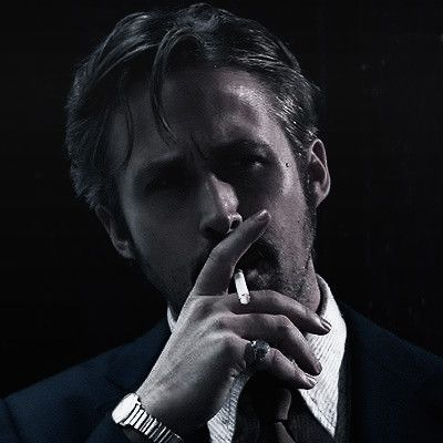 A sharply dressed man in a dark suit with slicked-back hair takes a contemplative drag from a cigarette, his silver wristwatch and ring catching the dim light against a black background. The moody, cinematic portrait complements the post's urgency, lending a "cool, calculated" energy to the message about not missing out on the meme + utility project's whitelist spots.