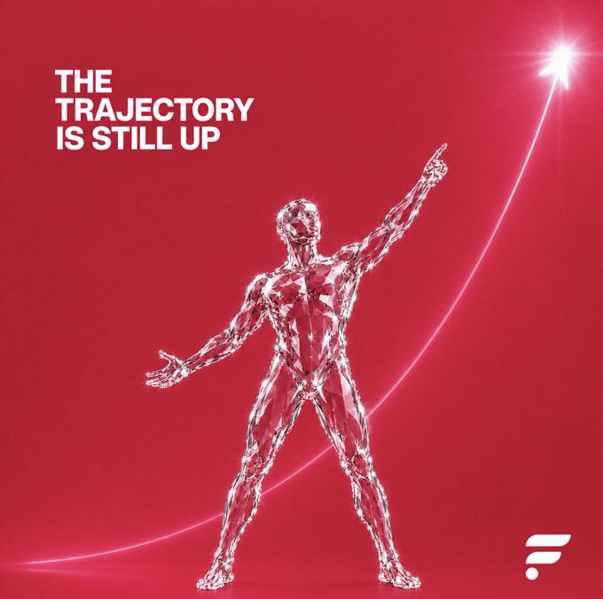 A promotional graphic featuring a faceted, crystalline human figure pointing upward toward a bright light, with the text 'THE TRAJECTORY IS STILL UP' on a red background.