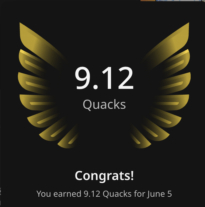 The image shows an award for Quacks, which is a gold-colored trophy with a bird's wing design. It has the number 9.12 displayed at the top of the image. The caption below the image reads "congrats! You earned 9.12 Quacks for June 5". This post seems to be promoting or celebrating someone's achievement in the Quack category, possibly as part of an online competition or contest.