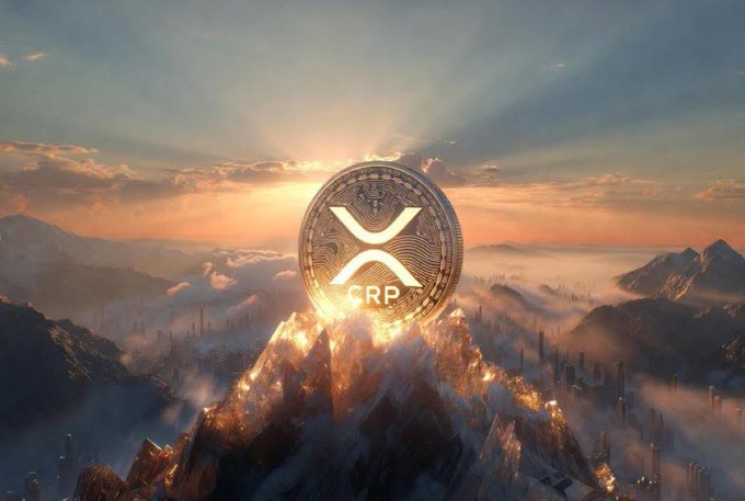 A glowing XRP coin branded with "XRP" sits atop a fiery mountain peak at sunrise, towering over a vast landscape—symbolizing the ambitious post speculating whether XRP could reach an astronomical $100,000 valuation by 2030.